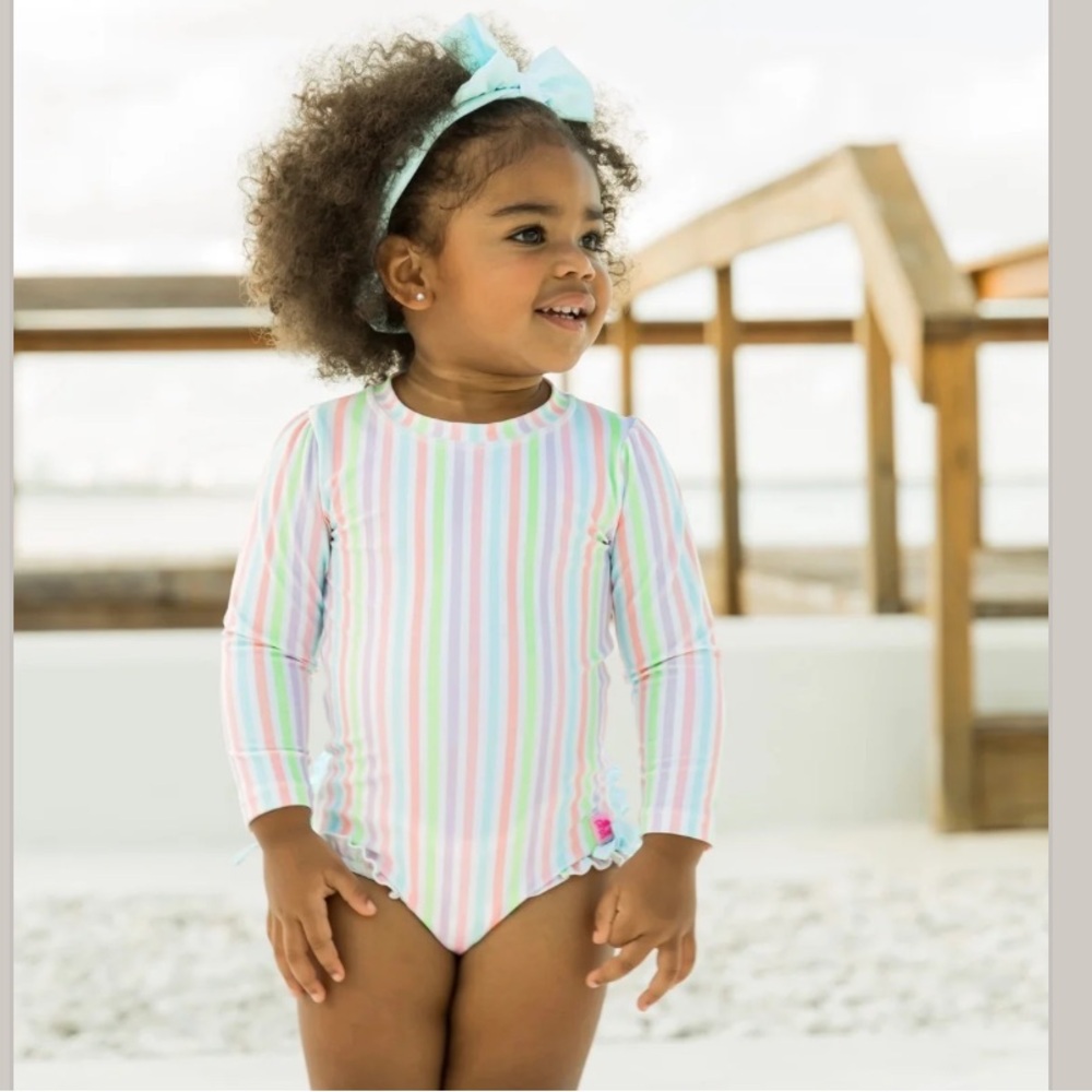 Ruffle Butts Pale Rainbow Stripe Long Sleeve One Piece Rash Guard